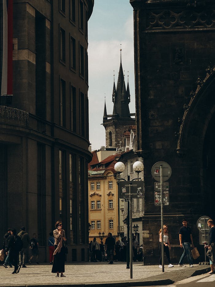 why-choose-us-02 Experience the bustling urban scene of Prague's historic streets with iconic gothic towers.